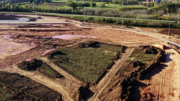 Commercial site development with grading equipment
