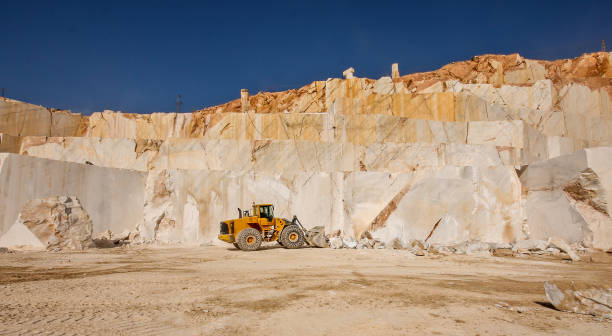 Earthmoving equipment excavating foundation